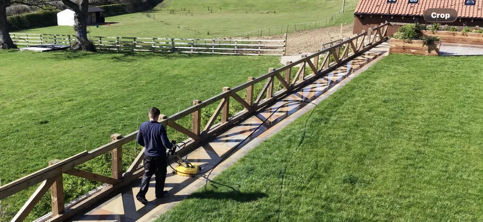 Domestic garden pathway and paving during exterior pressure-washing work