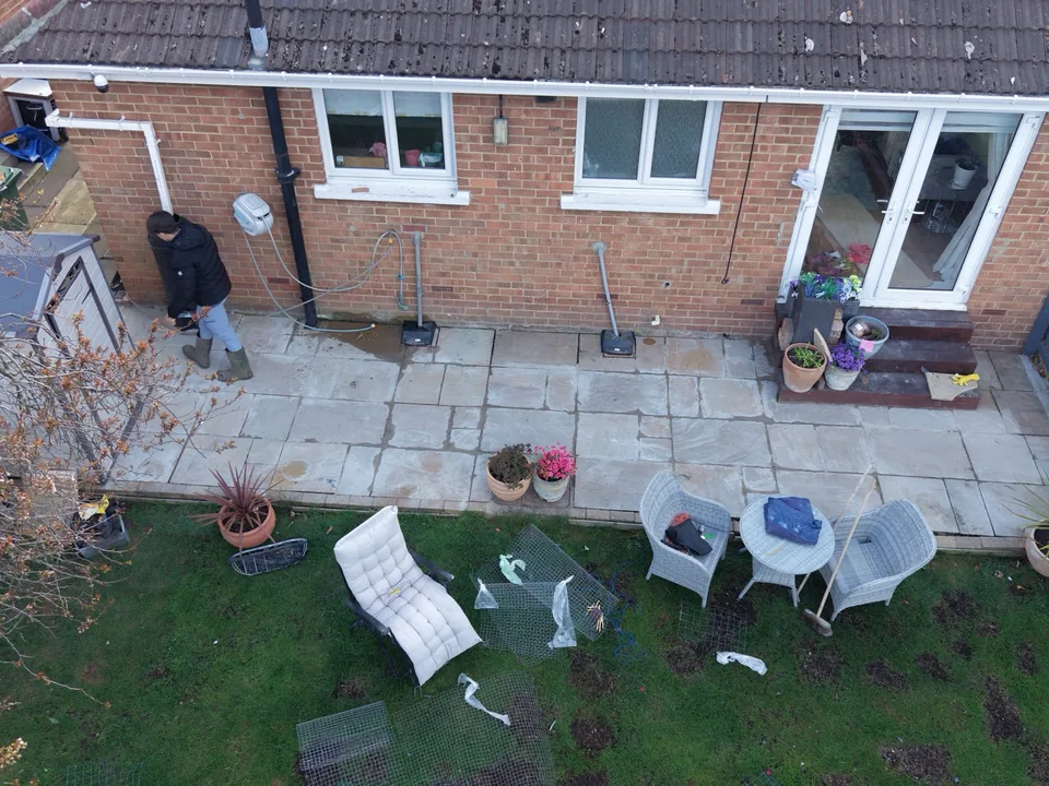 Domestic patio and paving during exterior pressure-washing work