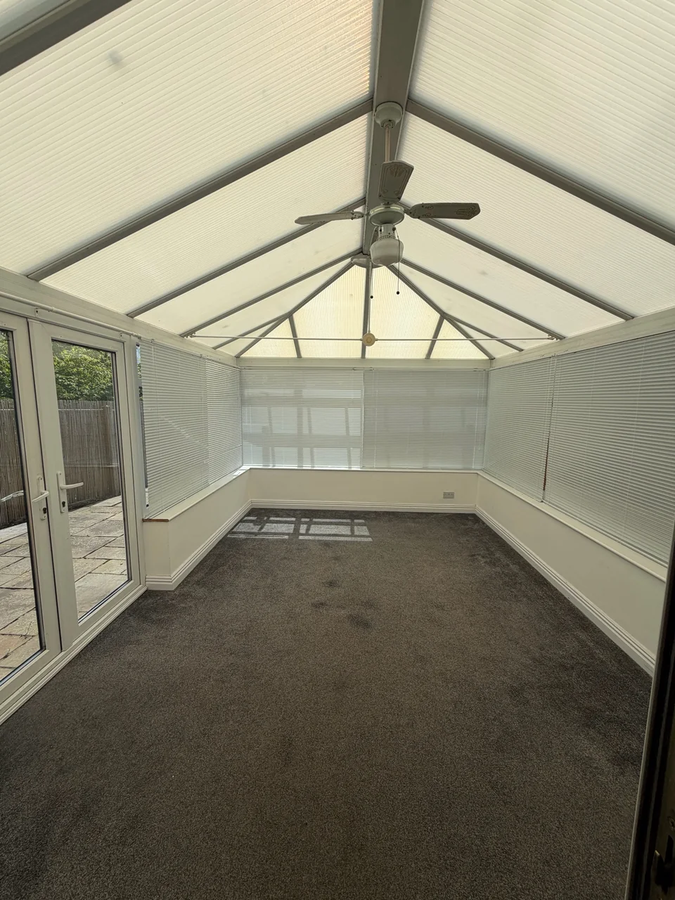 Glazed room shown as part of a completed end-of-tenancy cleaning portfolio record