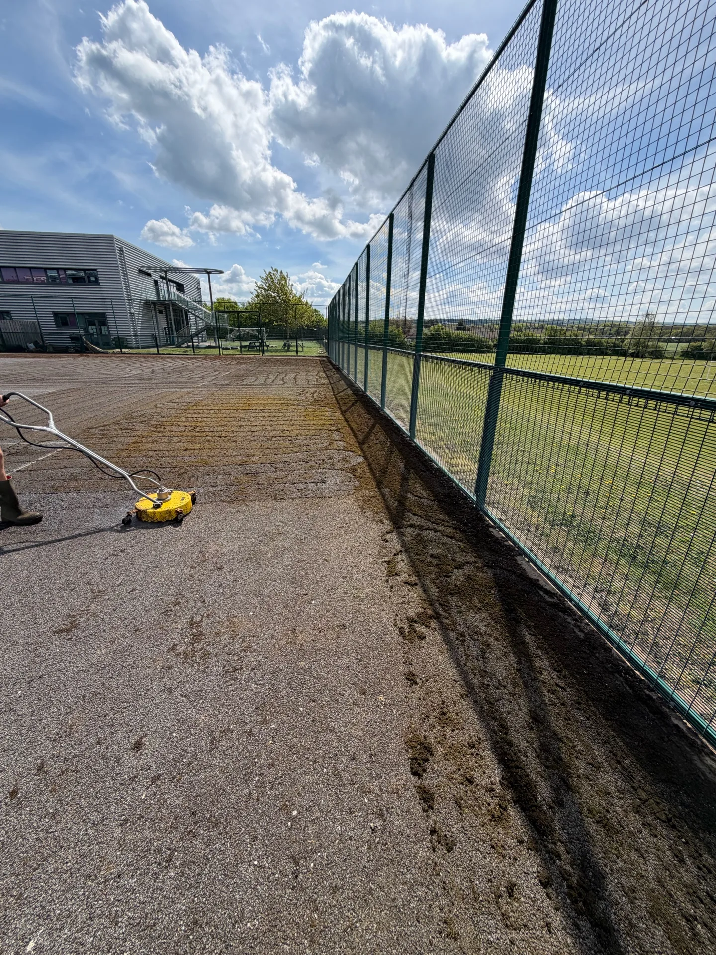 Freebrough Academy tennis court during surface cleaning