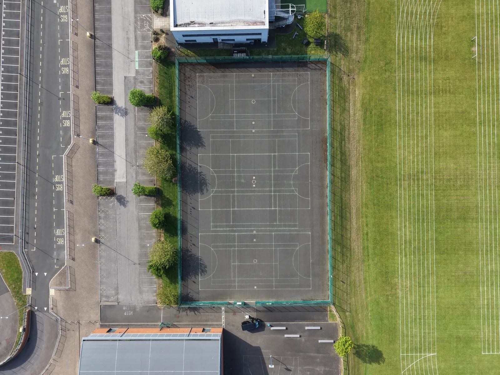 Top-down aerial view of the Freebrough Academy tennis-court layout