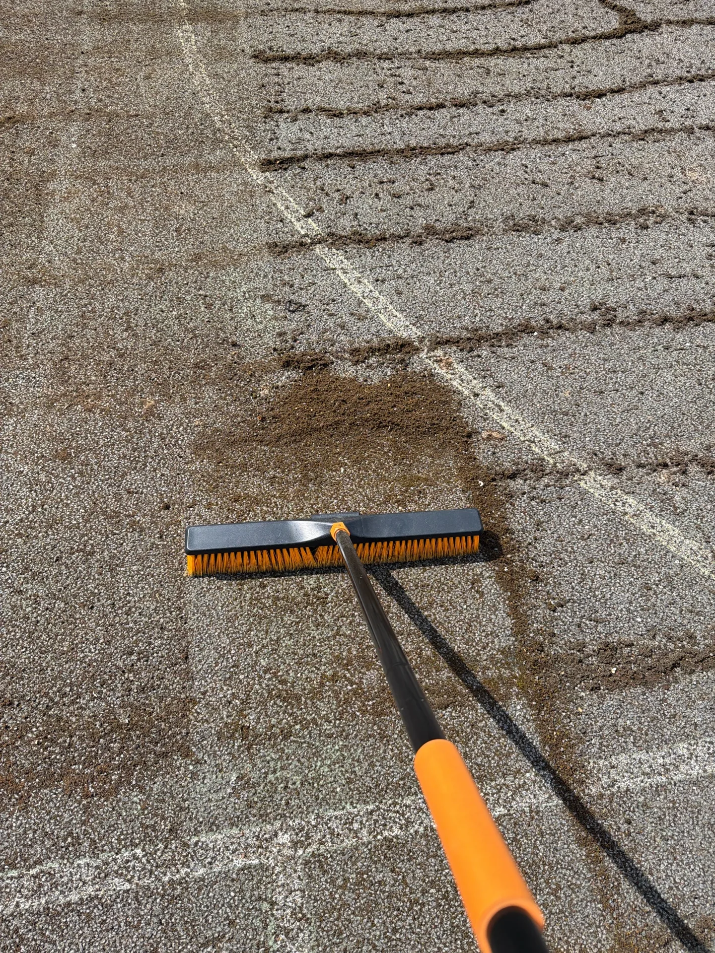 Freebrough Academy tennis-court surface condition during cleaning
