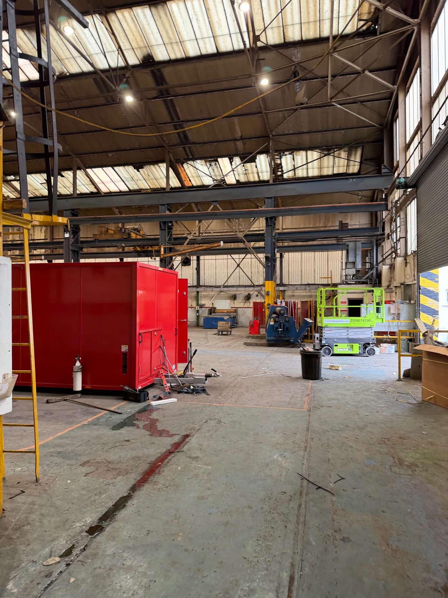 PACS Marine warehouse work area before builders-clean work