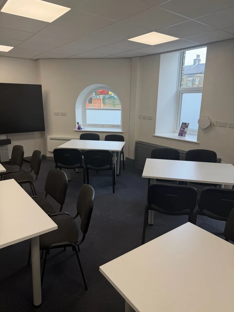 Freshly cleaned classroom with clear floor space at a school deep-clean project