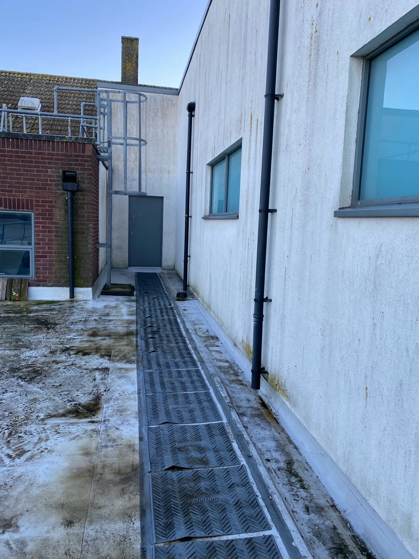 School roof-edge condition recorded during the roof-and-gully cleaning programme